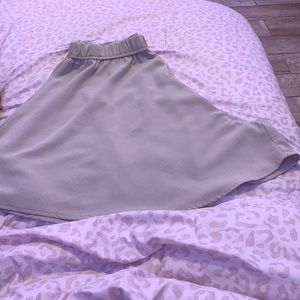 Super cute beige shorts that are made to look like a skirt